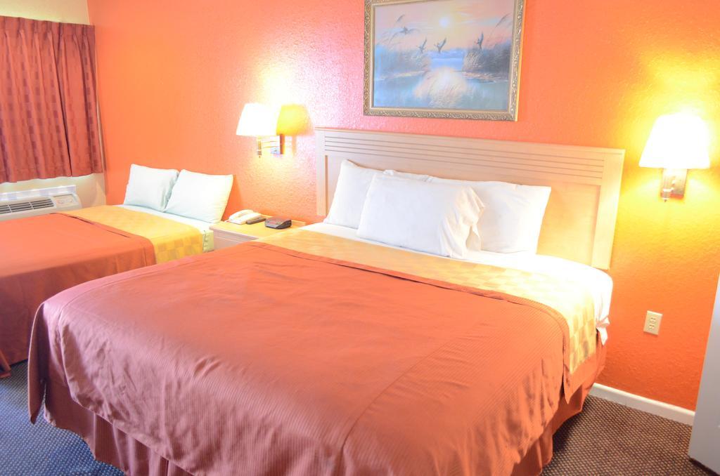 Texan Inn & Suites Houston Habitación foto